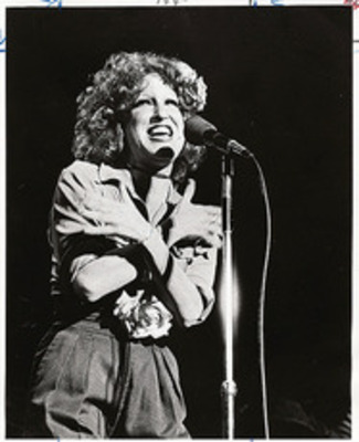 Bette Midler. "It was a remarkable adventure to return to Hawaii," Bette Midler said on the Tonight Show. The Johnny Carson program featuring Miss Midler performing a medley of songs from the 1940s and talking about her career will be shown on KHON, Channel 2, at 10:30 p.m., tomorrow. Star-Bulletin photo by Bob Young on September 6, 1973. Ran on Tuesday, September 18, 1973 and Sunday, August 21, 1977.