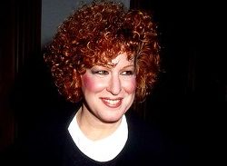 color-photo-bette-midler-smiling-arm-raised-440nw-10498105a