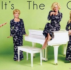 Promo photo of four women in 1960s-style outfits around a white piano on a lime background; headline reads 'It's The Girls!'