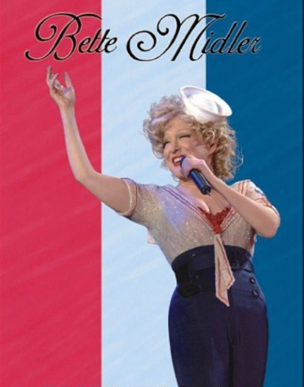 Bette Midler performing on stage with a microphone, wearing a sparkly blouse and dark pants, against a red-white-blue vertical striped background with cursive text at the top.