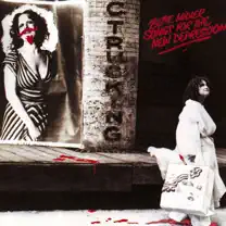 Urban street scene with a bold poster of a striped figure wearing a red clown nose, while a woman in a white dress walks by; red paint stains on the ground nearby.