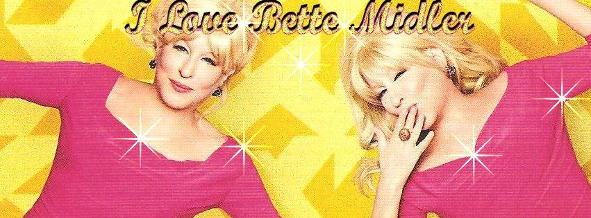 Two women in pink tops pose playfully against a bright yellow geometric background, with the text 'I Love Bette Midler' at the top.