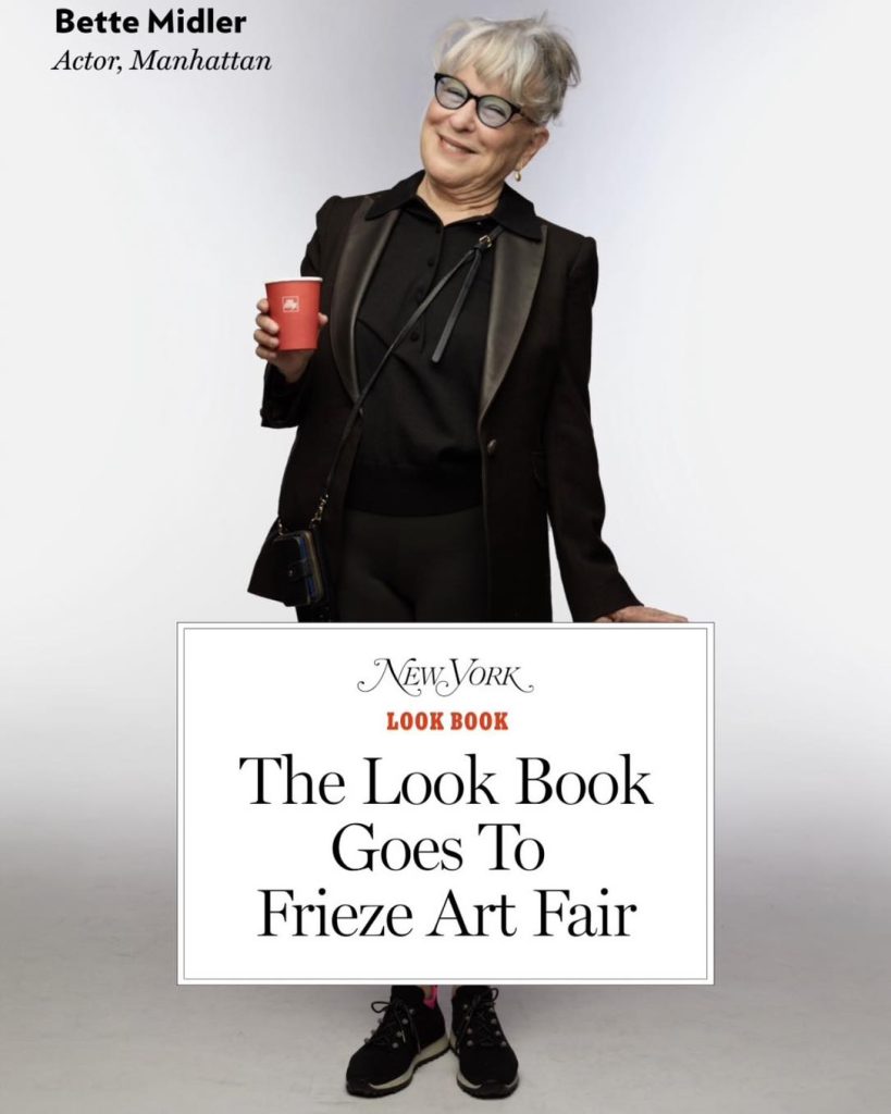 703170426_1453138620190534_6698617718838222024_n - bootleg betty Bette Midler smiling in a black outfit, holding a red cup, with a text panel reading 'New York Look Book: The Look Book Goes To Frieze Art Fair'