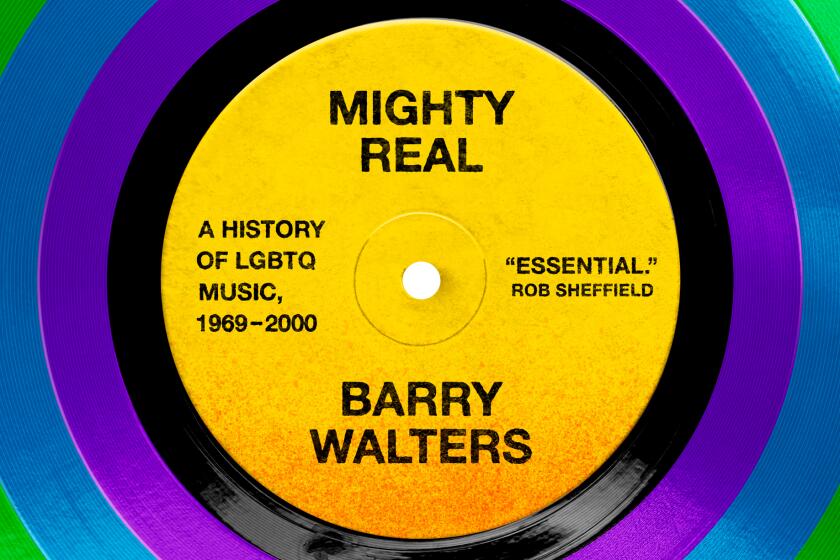 Close-up of a rainbow-colored vinyl record with a bright yellow center label that reads 'Mighty Real' and 'Barry Walters' with the subtitle 'A History of LGBTQ Music, 1969–2000'.