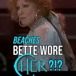 Video thumbnail of a woman with curly red hair and large hoop earrings, overlay text 'BEACHES BETTE WORE HER?!?' and a blue circular logo.