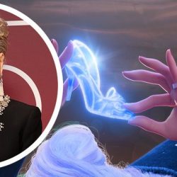 Smiling older woman with silver hair wearing a diamond necklace; circular inset portrait on the left with blue magical glow from a hand on the right.