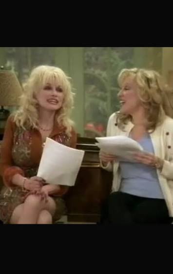 Images 8 - bootleg betty Two blonde women sit side by side, each holding papers, smiling as they chat on a TV set.