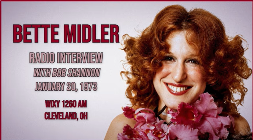 Promotional poster of Bette Midler smiling with pink flowers; text advertises a 1973 radio interview with Bob Shannon in Cleveland.
