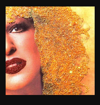 Close-up of a woman's face with dark eye makeup and bright red lipstick, gold glitter hair on the right side of the image.