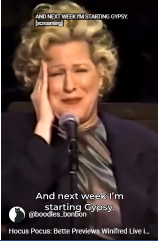 Female performer at a microphone on stage, hand to temple, with quoted captions on screen: “And next week I’m starting Gypsy.”