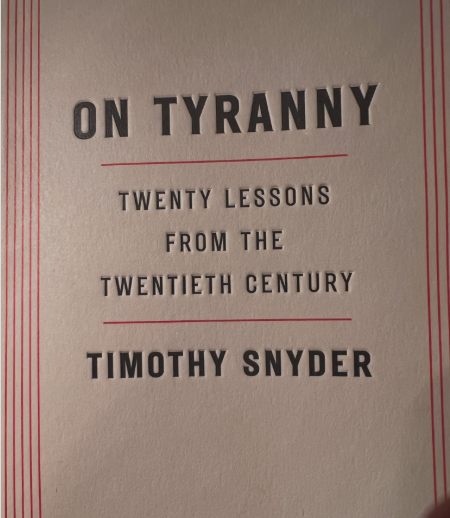 Book cover showing the title “On Tyranny: Twenty Lessons from the Twentieth Century” by Timothy Snyder with red decorative lines on a light background.