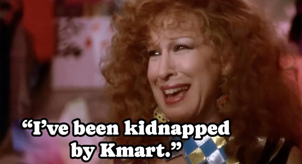 Laughing woman with a large caption reading 'I've been kidnapped by Kmart.'